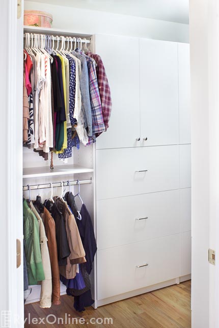 Efficent Master Closet in Awkward Angled Space