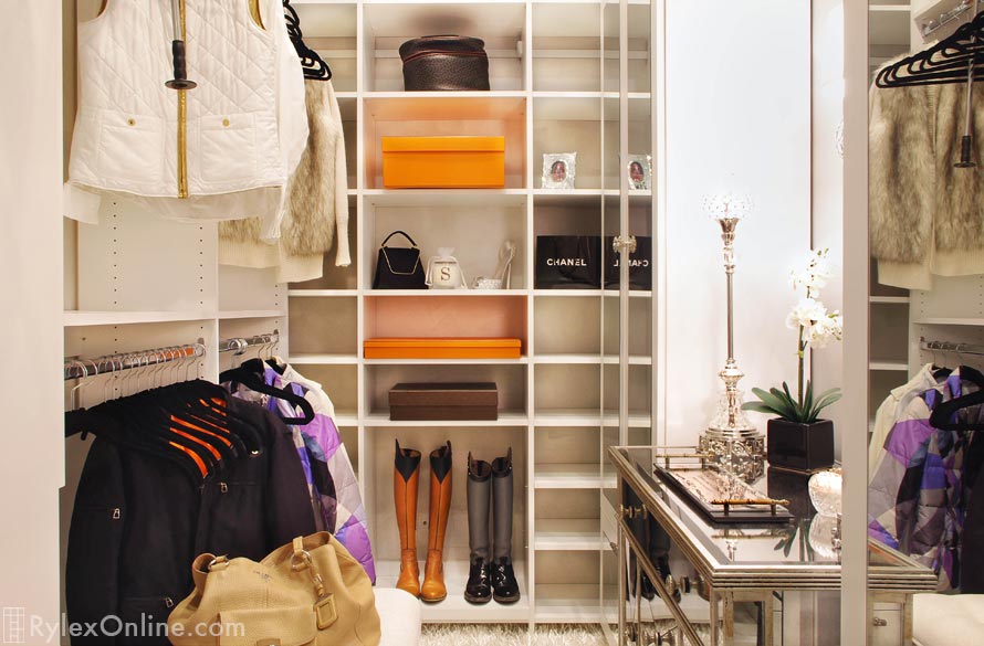 Glamorous Dressing Room Closet with Open Shelves, Dual Hanging Space, Pull Down Closet Rods and Mirrored Cabinet Doors