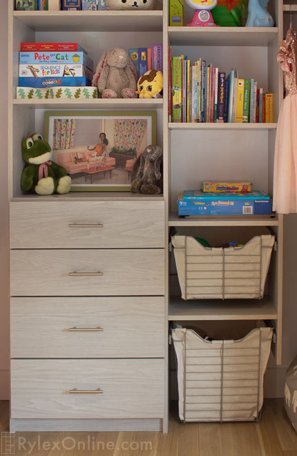 Kid's Closet with Cabinet Drawers and Sliding Baskets Close Up