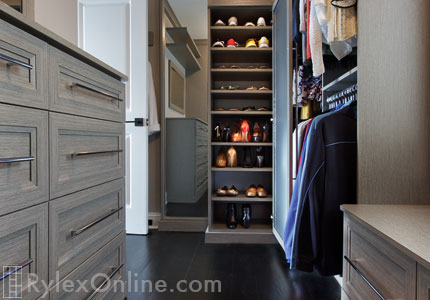 Closet with Floating Shelves and Matching Framed Mirror