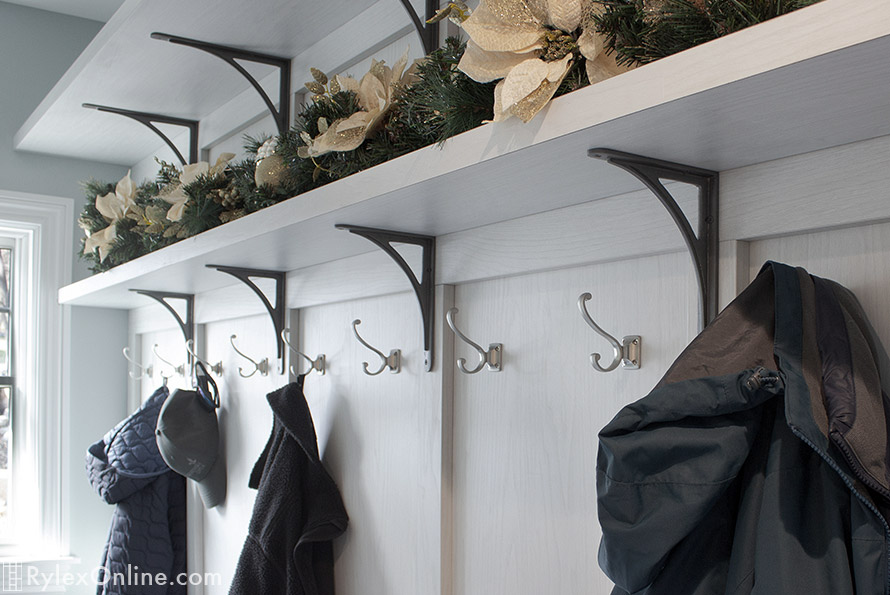 Mudroom Open Shelves with Cast Iron Brackets and Coat Hooks