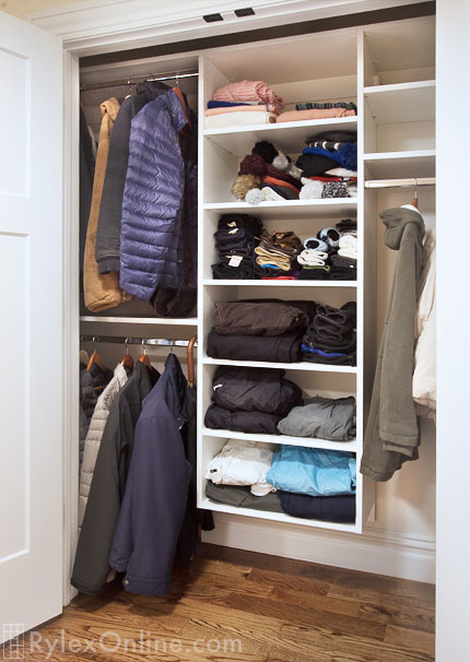 Backdoor Closet with Open Shelves and Hanging Rods