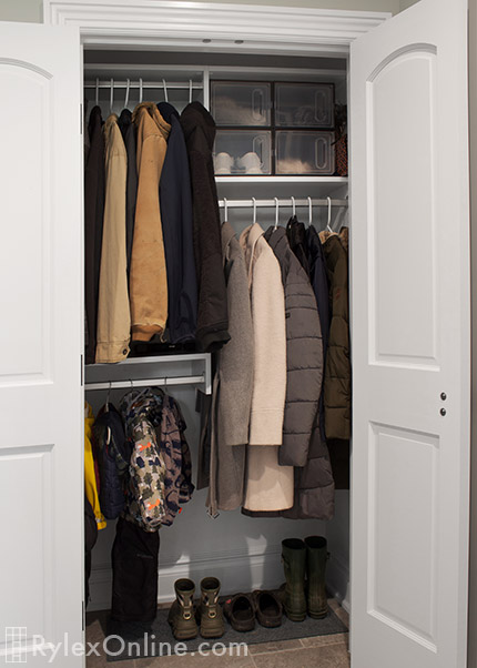 Coat Closet Effcient Storage and Rods Close Up