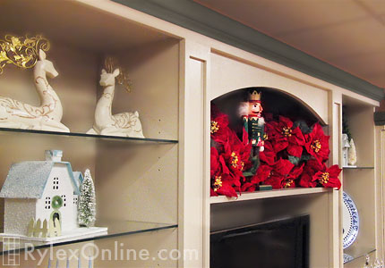 Display Cabinet with Open Glass Shelves and Crown Moulding Close Up