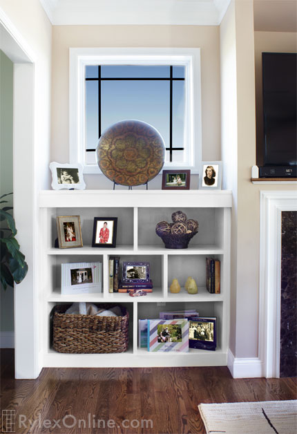 White Fireplace Shelves with Collectibles and Books