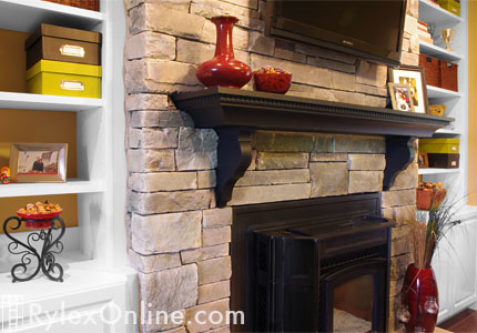 Cabinet with Bookcase and Custom Fireplace Mantel with Corbels Close Up