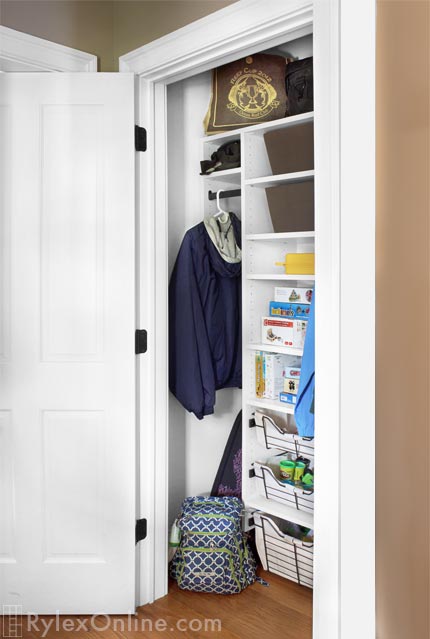 Games and Toy Storage Closet with Sliding Baskets