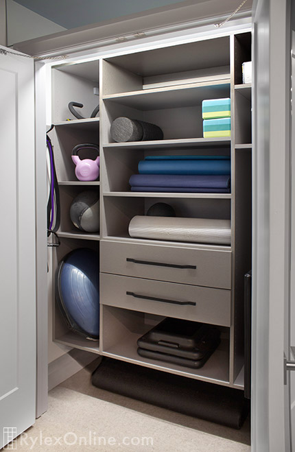 Home Gym Storage Closet with Open Shelves and Drawers
