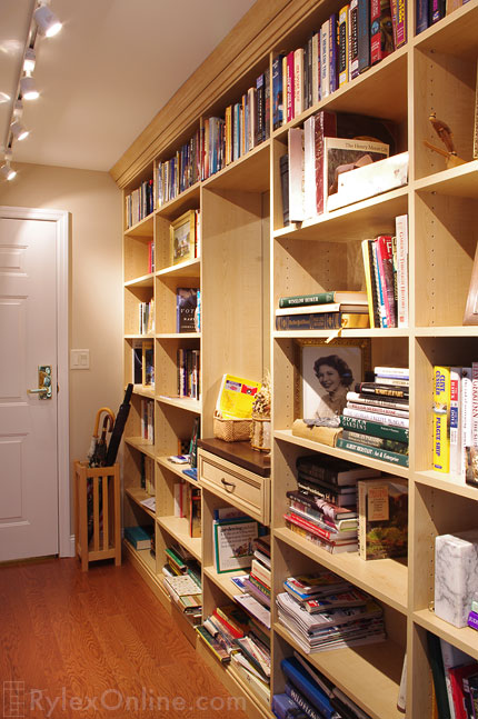 Library Shelves Wrap the Room From the Entryway