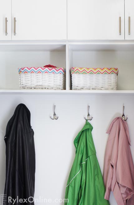 Mudroom with Hooks and Storage Cabinets with Open Shelves Close Up