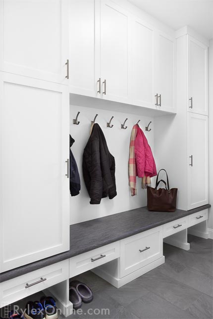 Mudroom with Cabinets and Bench Off Garage