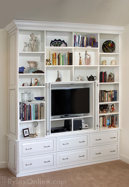 Media Unit with Sophisticated Cabinet Doors Concealing Big Screen TV