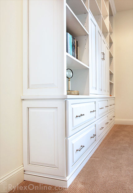 Sophisticated Entertainment Center Profile of Closed TV Cabinet Doors and Deep Guest Storage Drawers