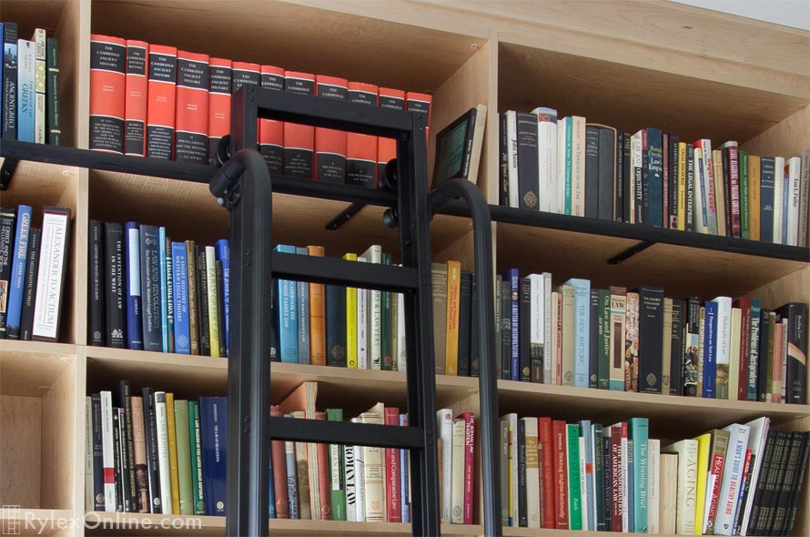 Library Ladder Rests on Upper Shelves