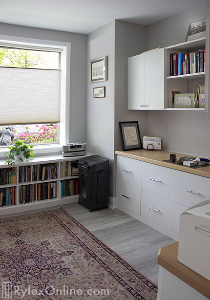 Office with Abundant Cabinet Drawers and Stand-alone Bookcase
