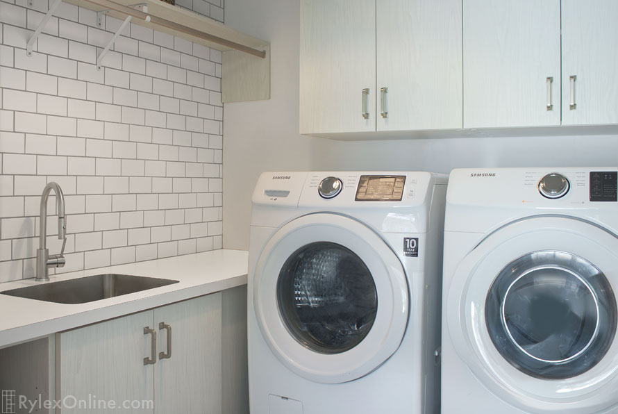 Functional Laundry Room Winter Fun with White Counters