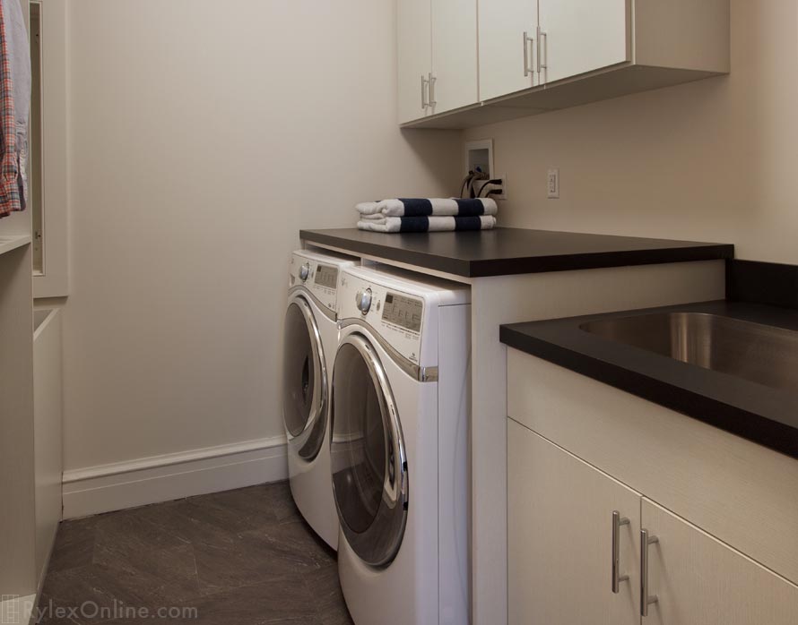 Laundry Island with Cabinets and Folding Counter