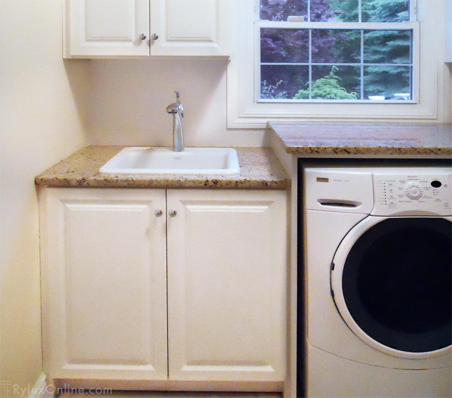 Laundry Room Folding Counter and Storage Cabinets