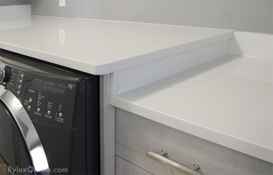 Laundry Counters at Multi-Levels Makes Folding Laundry Easier