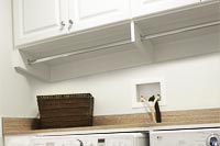 Compact Laundry Cabinets with Hanging Rods