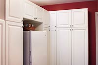 Organized Pantry Cabinets with Sliding Baskets