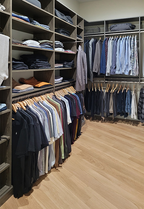 Classic Organized Men's Closet with Ample Hanging Closet Space