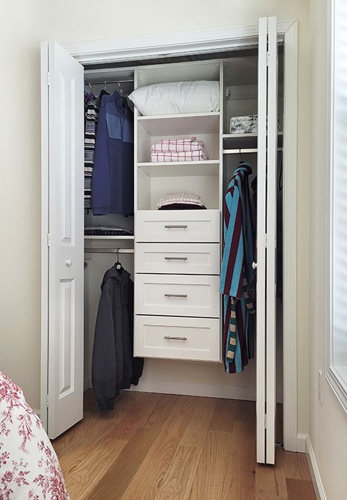 White Guest Room Closet with Drawers in Cold Spring, NY