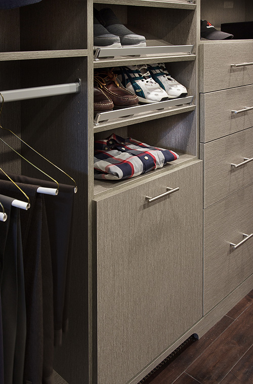 Angled Shoe Shelves with Fence and Tilt Out Hamper Drawer