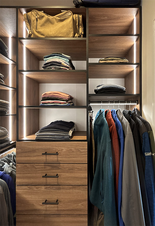 Stylish Men's Closet Open Shelving and Custom Drawers with Hanging Lighted Garment Rod