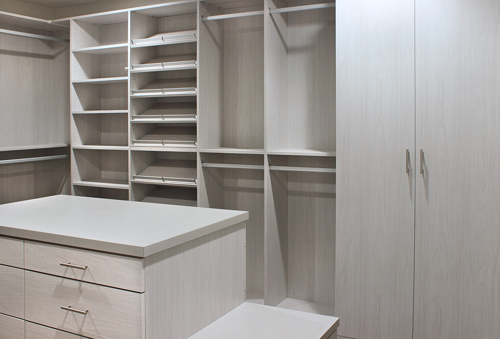 Closet with Island, Bench and Angled Shoe Shelves