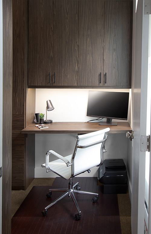 Small Desk Tucked in Master Closet