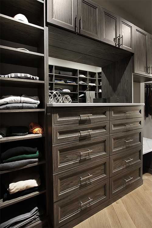 Men's Closet with Dresser and Adjustable Clothes Shelves and Upper Cabinets