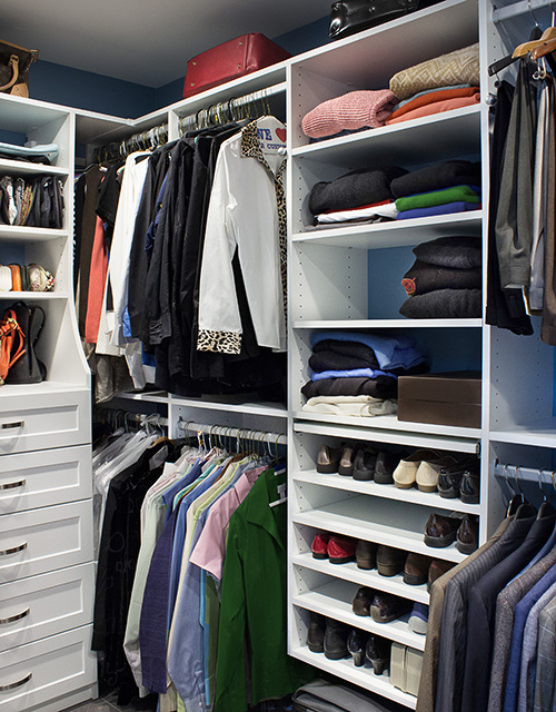 White Bedroom Closet with Abundant Shoe Shelves and Hutch