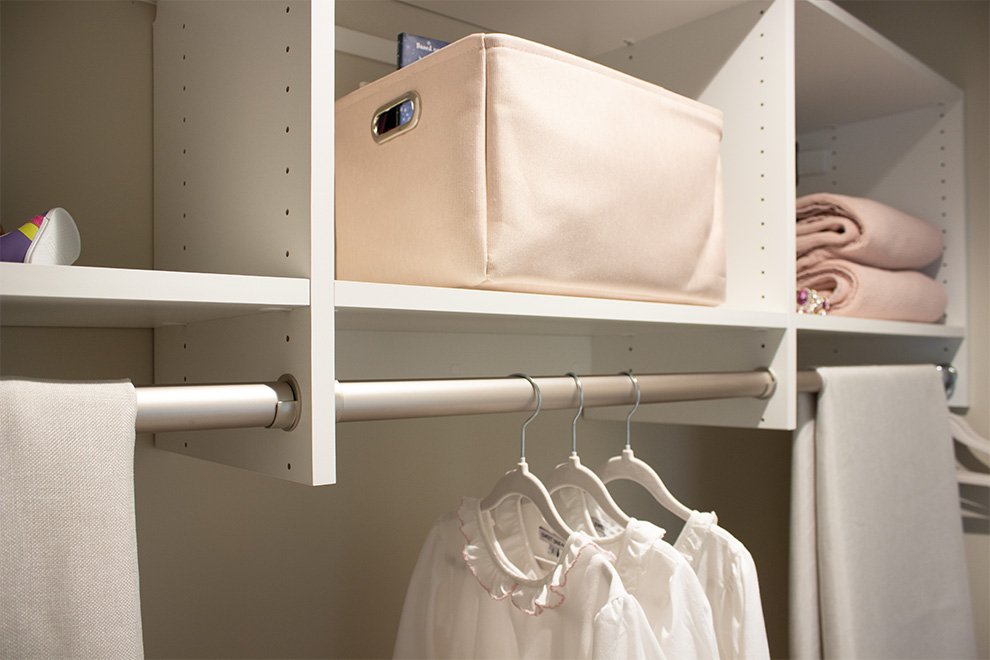 White Guest Closet with Adjustable Shelves