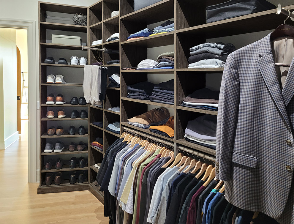 Spacious Closet with Adjustable Shoe Shelves and Two Valet Sliding Rods