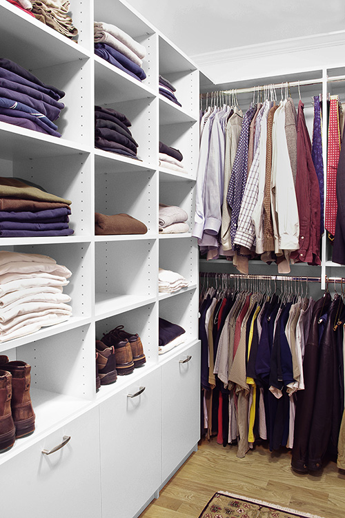 White Walkin Closet with Laundry Drawers and Adjustable Shelves