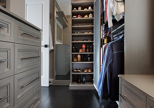 Closet with Floating Shelves and Matching Framed Mirror