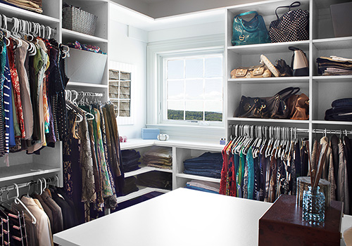 Women's White Closet Center Island with Window Cabinet Shelves and Open Shelving