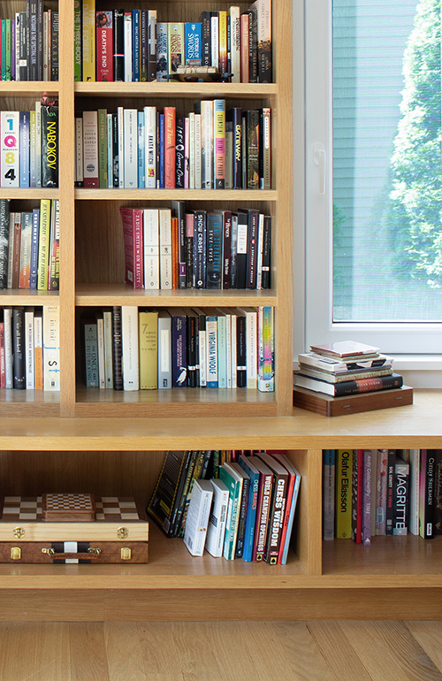 Custom Built-In Shelving Around Window with Bench