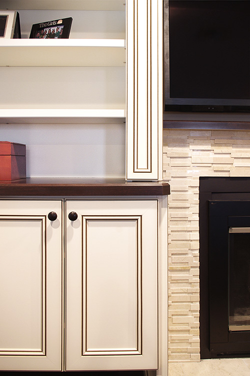 Antique White Fireplace Cabinet with Open Shelves and Slim Profile End Cabinet Close Up