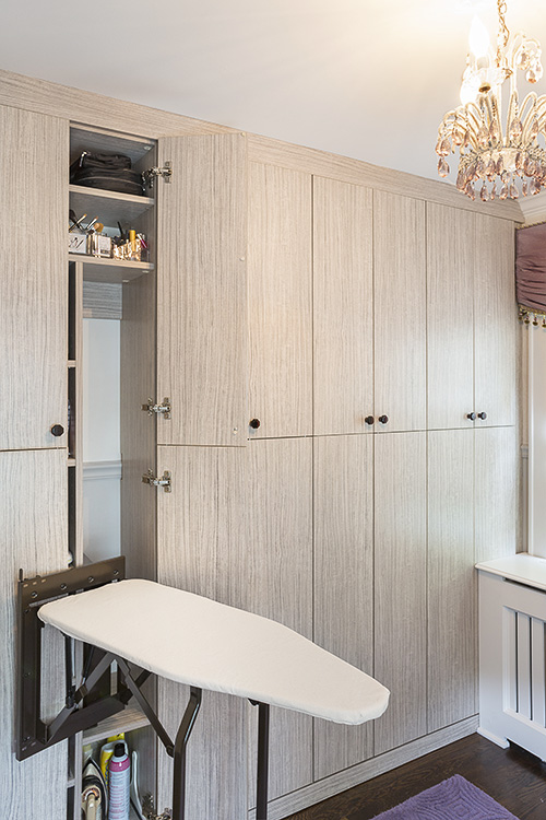 Ironing Board Folds into Cabinet