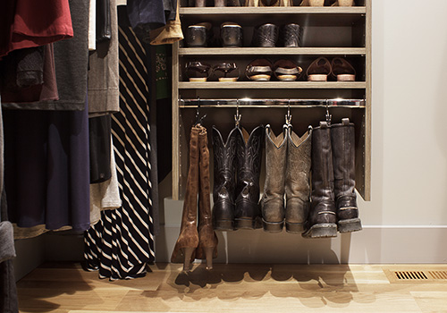 Boot Storage on Hanging Rod in Cabinet