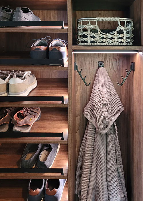 Angled Closet Shoe Shelves with Satin Chrome Fence for Rylex Closet Designs - View More