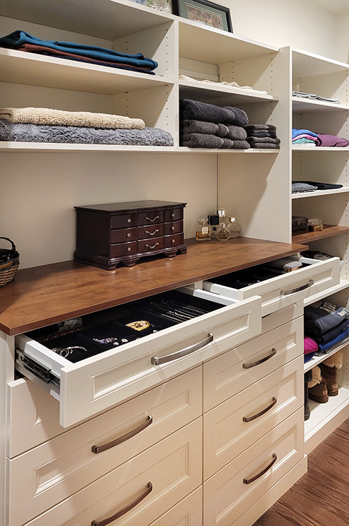Small Walk-In Closet Bureau with Velvet Lined Jewelry Drawers and Open Adjustable Shelves and Accent Wood Bureau Top