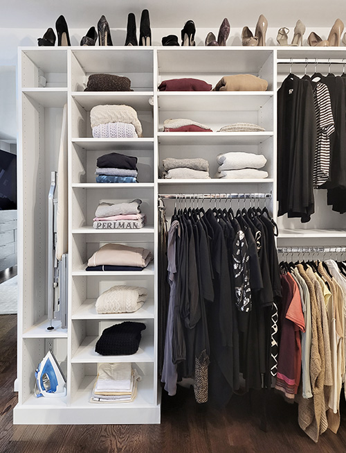 Primary Custom Closet with Adjustable Open Shelving and Folding Ironing Board