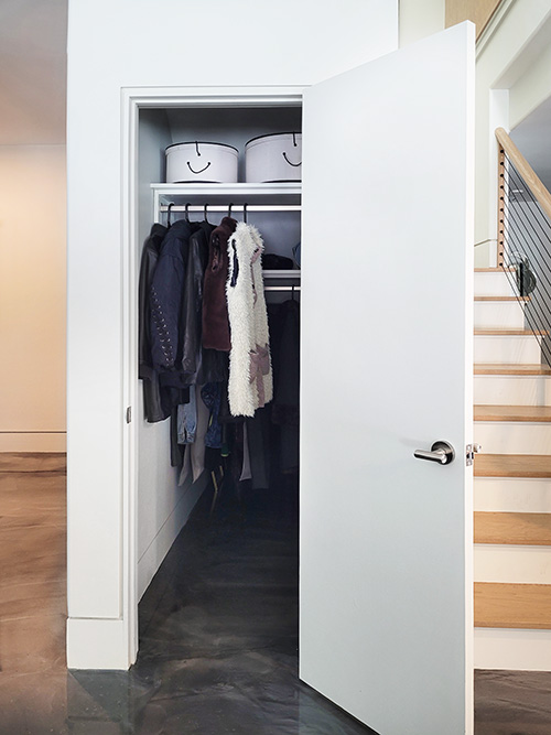 Deep Coat Closet with Second Hanging Rod Behind the Front Rod