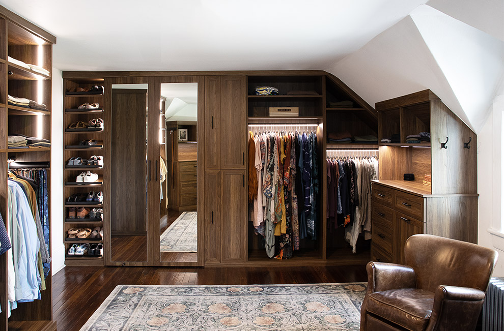 Shared His and Hers Closet with Bureau Style Cabinet, Lighted Garment Rods, Shoe Shelves Behind Mirrored Doors in Cornwall-On-Hudson, NY