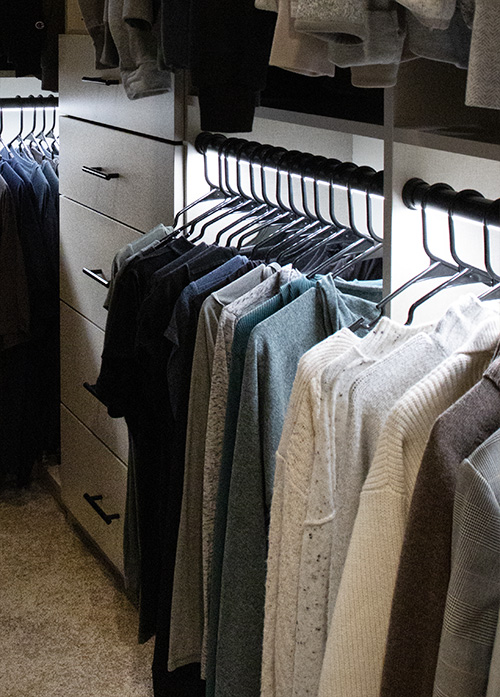 Lighted Walk-In Closet with Drawer Storage Featuring Lighted Garment Rods - View More Options