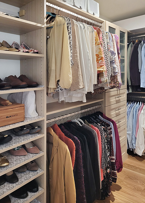 Shared Primary Closet with Cabinet Hutch, Hanging Space & Adjustable Shoe Shelves
