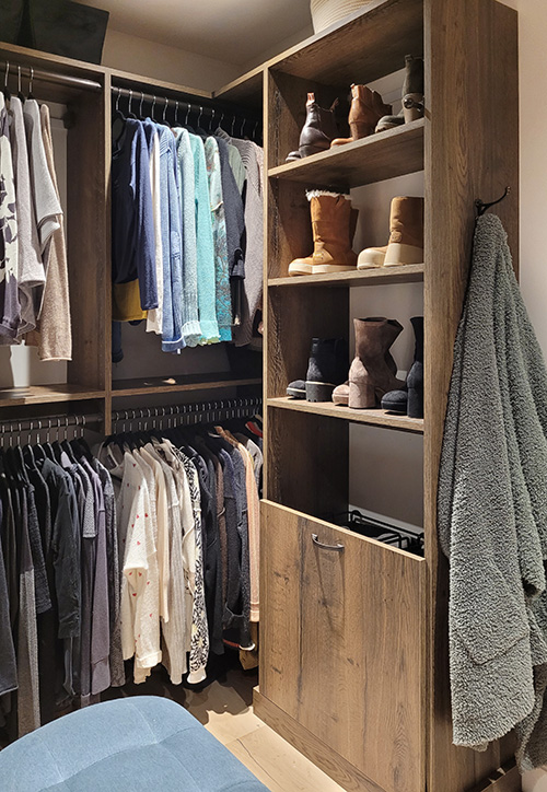 Primary Custom Walk-In Closet with Generous Hanging Space and Synergy Tilt-Out Hamper